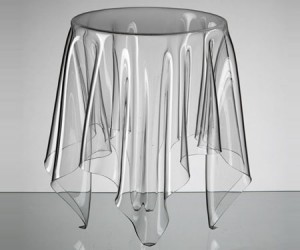 The Illusion side table is hand-made of acrylic, making each piece as unique as the d...